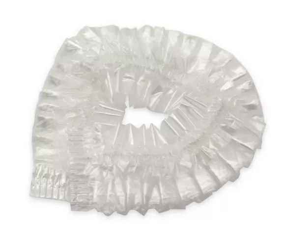 Plastic shower cap in a bag